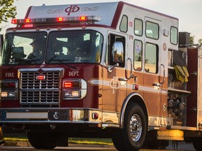 Aryn Toombs/Calgary Herald CALGARY, AB -- August 18, 2015 -- STK A Calgary Fire Department truck at Bishop McNally High School in Calgary on Tuesday, Aug. 18, 2015. (Aryn Toombs/Calgary Herald) (For STK) SLUG: 9999 Calgary Fire Department