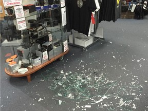 Shattered glass covers the floor of the Camera Store after thieves made off with high-end camera gear in an early-morning break-in. Courtesy The Camera Store