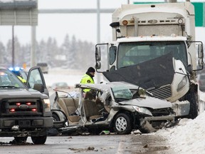 Calgary police at the scene of a serious crash in the northbound lanes of Deerfoot Tr. near Anderson Rd. Gavin Young/Postmedia Network