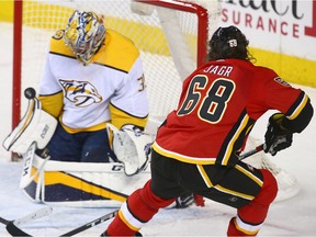 Flames Jaromir Jagr shoots on Predators goalie Pekka Rinne during NHL action between the Nashville Predators and the Calgary Flames in Calgary Saturday, December 16, 2017.