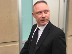 Const. Robert Cumming leaves court after his acquittal on three criminal charges.