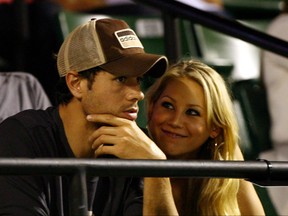 Enrique Iglesias and girlfriend Anna Kournikova watch as Venus Williams plays her semifinal match against Serena Williams at the Sony Ericsson Open at the Crandon Park Tennis Center on April 2, 2009 in Key Biscayne, Florida. (Al Bello/Getty Images)