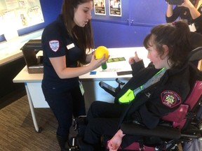 Eleven-year-old Erin Donaldson gets fingerprinted at the Youthlink Calgary Police Interpretive Centre as part of her day learning the ins and outs of policing in the city. Courtesy Calgary Police Service