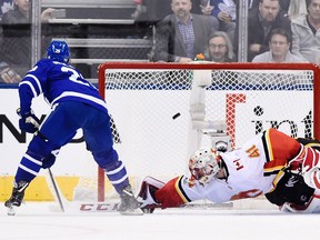 Toronto Maple Leafs centre William Nylander scores on Calgary Flames goalie Mike Smith during shootout NHL hockey action in Toronto on Wednesday, December 6, 2017.