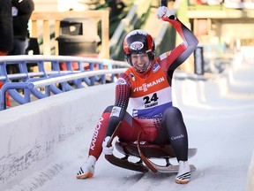 Canada's Alex Gough, celebrates her second place finish in the women's World Cup luge competition in Calgary, Saturday, Dec. 9, 2017.