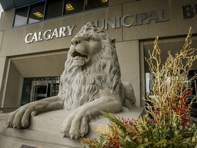 The original 1916 Centre Street Bridge lion stands outside of City Hall in Calgary.