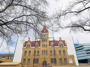 Calgary's old City Hall is slowly being wrapped with its own image as the sandstone building begins a multi-year restoration project. The building was photographed on Thursday May 4, 2017.