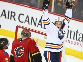 Oilers Jesse Puljujarvi celebrates his first goal of the night during NHL action between the Edmonton OIlers and the Calgary Flames in Calgary Saturday, December 2, 2017. Photo by Jim Wells/Postmedia