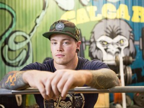 Bryce Krawczyk, 30, poses while training at The Strength Edge gym on Thursday, Dec. 7, 2017 in Calgary, Alta. The powerlifter set a world record 388 kilogram deadlift in the 105 kg division at the International Powerlifting Federation World Open Powerlifting Championships in Pilsen, Czech Republic, on November 16, 2017.