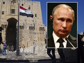 FILE - In this Tuesday, Sept. 12, 2017 file photo, visitors and Russian military police officers walk toward the Citadel, Aleppo's famed fortress. Russian news outlets say thousands of Russians have been deployed in Syria by a shadowy, private military contractor since 2015. When President Vladimir Putin announced Monday Dec. 11, 2017, that Russias campaign in Syria was drawing to a close, he did not mention this secret force. (AP Photo/Nataliya Vasilyeva, File)