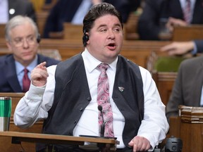 Minister of Veterans Affairs and Associate Minister of National Defence Minister Kent Hehr responds to a question during question period in the House of Commons on Parliament Hill in Ottawa on Thursday, April 14, 2016.