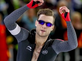 Canada's Laurent Dubreuil reacts after winning the men's 500 meters race of the ISU Speed Skating World Cup in Thialf Ice Arena in Heerenveen on Nov. 10, 2017