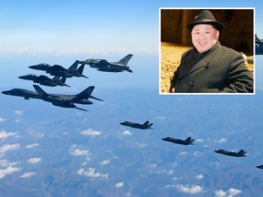 In this photo provided by South Korea Defense Ministry, U.S. Air Force B-1B bomber, far left, South Korea and U.S. fighter jets fly over the Korean Peninsula during the combined aerial exercise, South Korea, Wednesday, Dec. 6, 2017. The United States flew a B-1B supersonic bomber over South Korea on Wednesday in part of a massive combined aerial exercise involving hundreds of warplanes, a clear warning after North Korea last week tested its biggest and most powerful missile yet. (South Korea Defense Ministry via AP) and This undated picture released from North Korea's official Korean Central News Agency (KCNA) on December 6, 2017 shows North Korean leader Kim Jong-Un (L) inspecting the newly-built Samjiyon potato farina production factory in Ryanggang Province, North Korea. / AFP PHOTO / KCNA VIA KNS / STR /