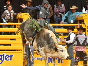 Jordan Hansen rides a bull named Tequila last night at the NFR. Photo by Dan Hubbell/PRCA.