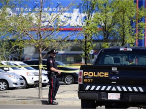 The scene of Calgary's latest homicide one day after the fact is still locked down outside of the Real Canadian Superstore in Mckenzie Towne in Calgary, Alta., on May 22, 2017.  Ryan McLeod/Postmedia Network