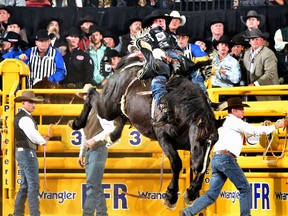 Jake Vold of Ponoka, Alberta rides Oakridge from Kesler Championship Rodeo for 87.5 points to win Round 1 of the Wrangler National Finals Rodeo in Las Vegas, Nevada on December 7th, 2017.