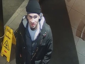 A surveillance camera image of Chase Spence, 23, of Calgary who is being sought by police in connection with the stabbing of two people at the Sheldon Chumir Centre on 4 St. SW. in December.