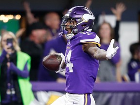 Stefon Diggs of the Minnesota Vikings celebrates after scoring a touchdown to defeat the New Orleans Saints in the NFC Divisional Playoff game at U.S. Bank Stadium on January 14, 2018 in Minneapolis, Minnesota. (Photo by Jamie Squire/Getty Images)