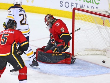 The Buffalo Sabres Jack Eichel's shot goes past Calgary Flames goaltender Mike Smith Rasmus to win in 2-1 in overtime during NHL action in Calgary on Monday January 22, 2018.