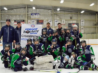 Springbank 7 Blue won the Atom 7 North division of the Esso Minor Hockey Week tournament that wrapped up Saturday.