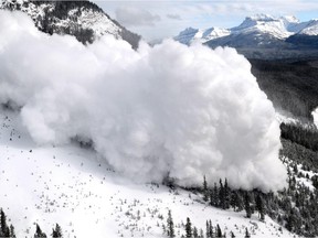 Parks Canada says weather conditions have led to a high avalanche risk in Banff, Yoho and Kootenay national parks. This file photo from December 2013 shows an explosive triggered avalanche in Banff National Park.