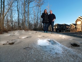 Fresh snow uncovered beneath a heavy coating of dust can be seen near the West Springs home of Mack and Lenore Kay on Monday December 11, 2017. Residents are frustrated with regular coatings of fine dust and noise from a nearby gravel pit.