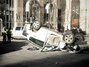 Police investigate a crash late Wednesday morning in downtown Calgary at 9th Avenue and 2nd Street S.W.