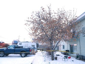 Calgary police guard the scene of an officer-involved shooting on Sunday, Jan. 28, 2018 in 600 block of 68 Ave SW.