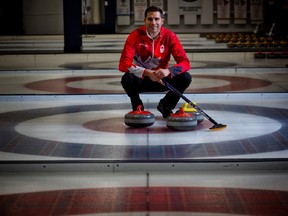 Canadian Olympic mixed doubles curler John Morris curls out of  the Glencoe Club in Calgary. Photo by Leah Hennel/Postmedia.