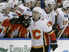 Johnny Gaudreau celebrates with the bench after scoring against the Tampa Bay Lightning on Jan. 11, 2018.