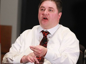 Kent Hehr, MP for Calgary Centre, federal minister for sport and persons with Disabilities, speaks in Calgary on Friday, Dec. 15, 2017. (Jim Wells/Postmedia)