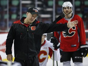 Calgary Flames' head coach Glen Gulutzan gestures during a team practice in Calgary, Monday, April 10, 2017. The Flames will play the Anaheim Ducks in the first round of the NHL playoffs. A year after Canadian teams were shut out of the NHL playoffs, five are poised to battle for the Stanley Cup in 2017.