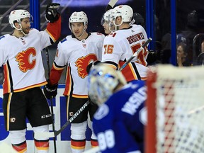 TAMPA, FL - JANUARY 11:  Mikael Backlund #11 of the Calgary Flames celebrates a goal during a game against the Tampa Bay Lightning at Amalie Arena on January 11, 2018 in Tampa, Florida.