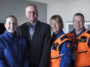 Liese Bielby, a Banff emergency medical services paramedic, STARS patient Jean-Francois Bussieres, Pat Jeffery, STARS flight nurse and John Doyle, STARS flight paramedic are pictured in the master bedroom of the 2018 STARS lottery show home on Thursday, Jan. 11, 2018. This grand prize home was built by Trico Homes and has a retail value of $948,000. Kerianne Sproule/Postmedia