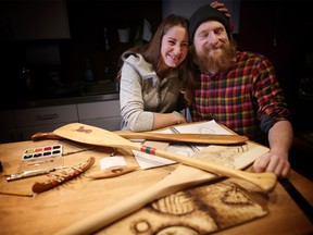 Canadaís top Womenís Canoe Slalom paddler Haley Daniels, 27, is hosting a painted paddle auction fundraiser on Wednesday, January 17, 2018. Her younger brother Hayden, 23 (on right), is one of the artists donating his artwork to the event. The auction will raise funds for the elder Danielsí 2018 paddling season. Leah Hennel/Postmeda