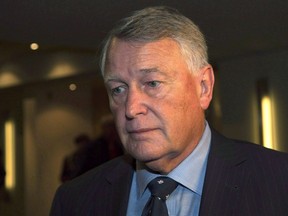 Federal Court Justice Robin Camp leaves a Canadian Judicial Council inquiry in a Calgary hotel on September 9, 2016.