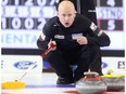 Canadian skip Kevin Koe watches a rock approach during their Friday morning draw against Benoit Schwarz of Switzerland at the World Financial Group Continental Cup at the Western Fair Sports Center in London, Ont., on Friday January 12, 2018.