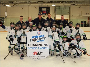 Springbank 5 Green won the Novice 5 North division of the Esso Minor Hockey Week tournament.