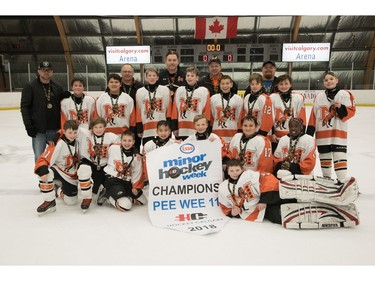 McKnight 8 won the Pee Wee 11 division at Esso Minor Hockey Week.