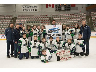 Springbank 9 won the Pee Wee 9 division at Esso Minor Hockey Week.