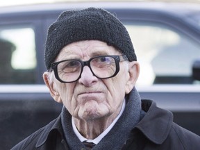 Former sportswriter Red Fisher arrives for the funeral of Montreal Canadiens' hockey legend Dickie Moore at the Mountainside United Church, in Montreal, on Monday, Dec. 28, 2015. Legendary hockey writer Fisher has died. The Montreal Gazette, where he worked the last 33 years of his career, reported on Friday that Fisher had died at age 91. THE CANADIAN PRESS/Graham Hughes