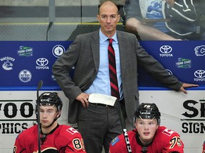 Ryan Huska coaches Flames prospects against the Edmonton Oilers during third period 2016 NHL Young Stars Classic action at the South Okanagan Events Centre in Penticton, BC., September 17, 2016.