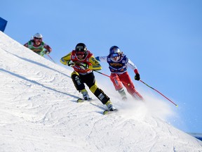 Sweden's Sandra Naeslund in action ahead of Switzerland's Fanny Smith, and Canada's Kelsey Serwa during the women's freestyle ski cross in Idre Fjall, Sweden, Saturday Jan. 13, 2018. The world's best ski-cross racers will roll into Nakiska for the 2018 Audi FIS Ski Cross World Cup this Saturday.