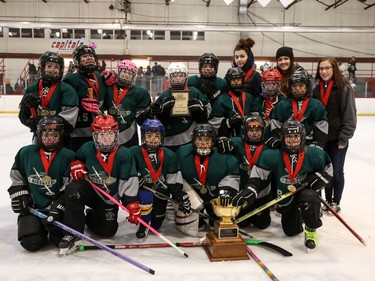 The Calgary East Sharp Shooters win gold in the U12C division of the Esso Golden Ring tournament. Shannon Hutchison photo