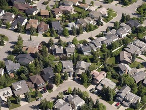 An aerial view of housing in Calgary is shown on June 22, 2013. THE CANADIAN PRESS/Jonathan Hayward ORG XMIT: CPT118