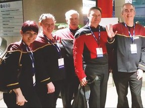 Vulcan Town councillors, the Towns administrator and mayor pose for a photo with Calgary Mayor Naheed Nenshi at the Alberta Urban Municipalities Association convention held in Calgary Nov. 21-24. From left are Couns. Michelle Roddy, Laura Thomas and Paul Taylor, administrator Kim Fath, Coun. Lyle Magnuson, Nenshi, Vulcan Mayor Tom Grant, and Couns. Georgia-Lee DeBolt and Lorna Armstrong. Supplied photo