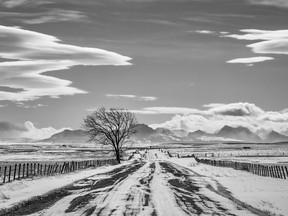 Looking south from Granum with chinook clouds and the mountains of Montana on the far horizon on Tuesday February 13, 2018. Mike Drew/Postmedia