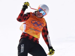 Dave Duncan of Canada, celebrates after winning heat 7 in the Freestyle Skiing Men's Ski Cross 1/8 finals on day 12 of the PyeongChang 2018 Winter Olympic Games at Phoenix Snow Park on February 21, 2018 in Pyeongchang-gun, South Korea.