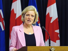 Alberta Premier Rachel Notley announces that she is suspending the province's ban on B.C. wine at the legislature in Edmonton, on Thursday, February 22, 2018. She said it is in response to B.C. Premier John Horgan announcing his province won't proceed with refusing to take elevated levels of oil from Alberta but will instead take the issue to court. THE CANADIAN PRESS/Dean Bennett ORG XMIT: DXB101