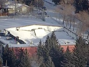 A view from a Global News helicopter after the roof collapsed at the Fairview hockey rink in southeast Calgary on Feb. 20, 2018.